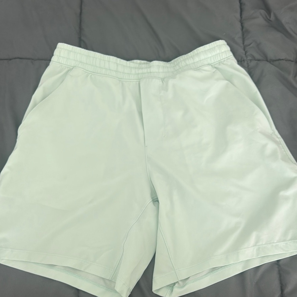 Lululemon Men's  mint Green pace Shorts

Worn a couple times
100% authentic